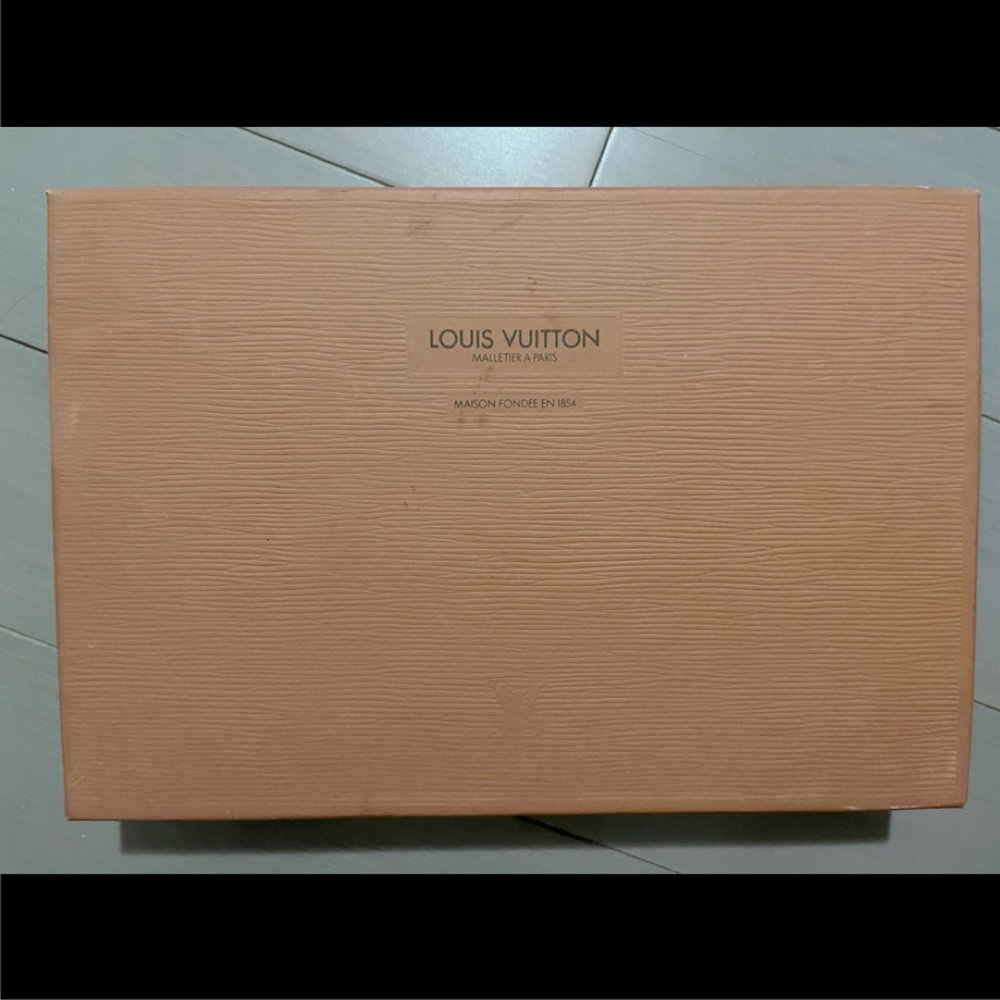 Authentic Louis Vuitton box and dust bag.